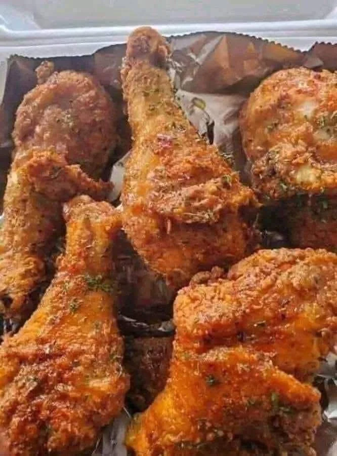 Delicious crispy fried chicken served on a plate with dipping sauce