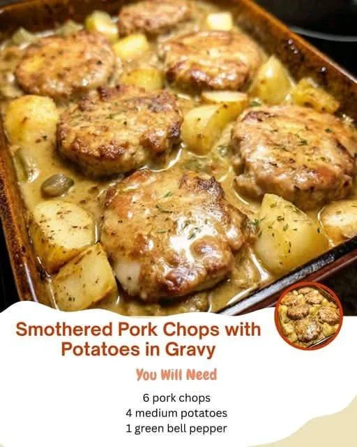 Smothered pork chops with potatoes in gravy served on a plate