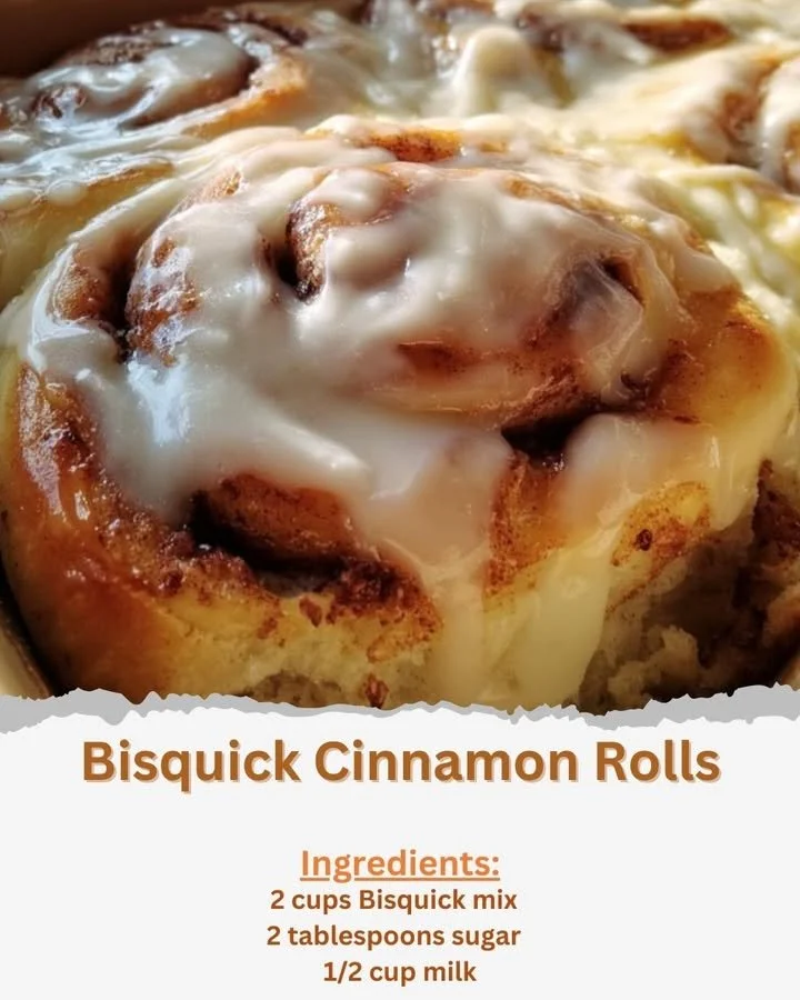 Freshly baked Bisquick cinnamon rolls with drizzled icing on top.