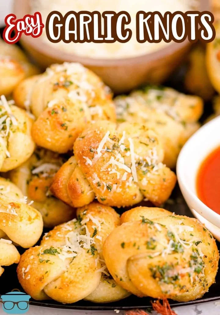 Easy Garlic Knots Freshly baked easy garlic knots served with marinara sauce.