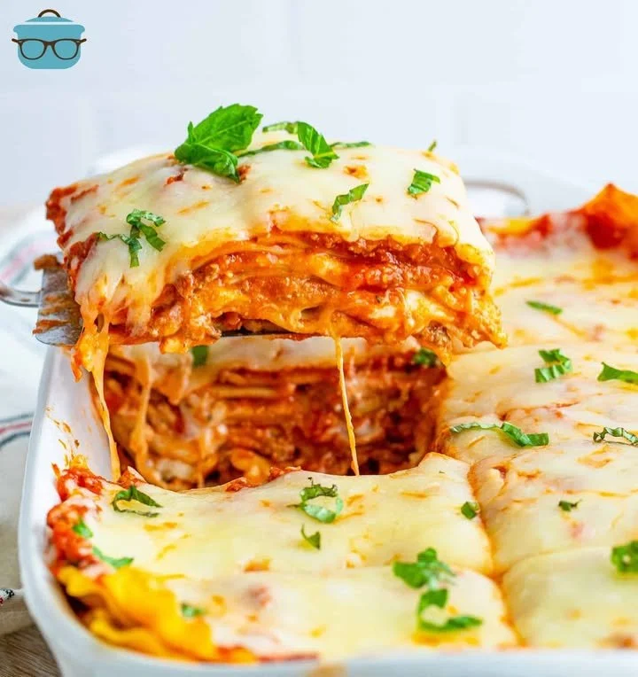 Homemade Baked Lasagna Delicious homemade baked lasagna with layers of cheese, meat, and tomato sauce