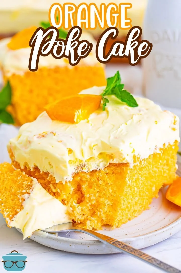 Orange Poke Cake Delicious Orange Poke Cake topped with orange glaze and fresh orange slices.
