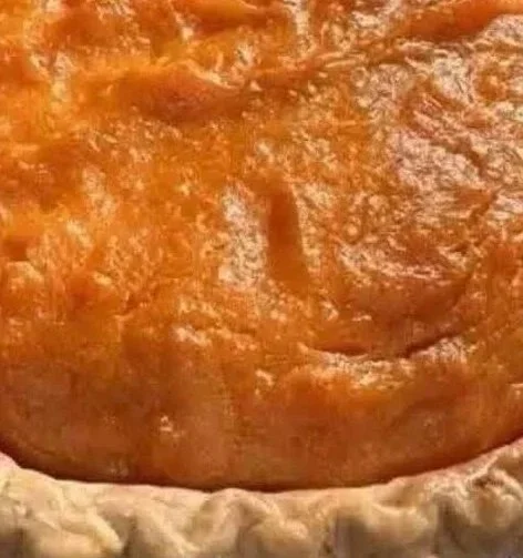 Sweet Potato Pie Delicious homemade sweet potato pie topped with whipped cream